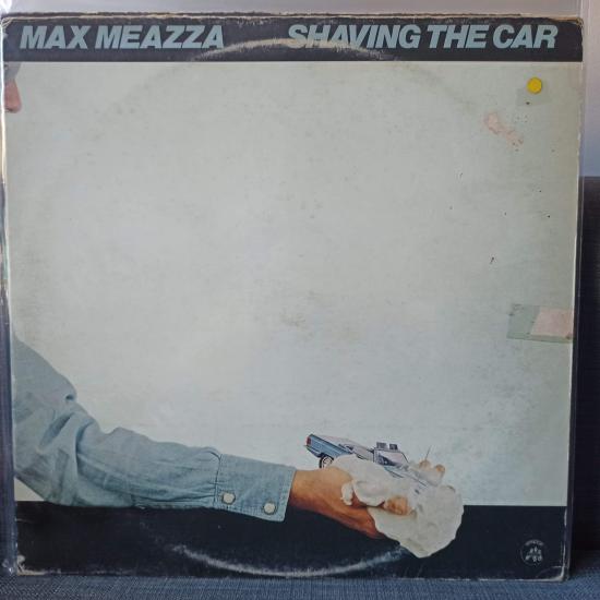 Max Meazza-Shaving The Car
